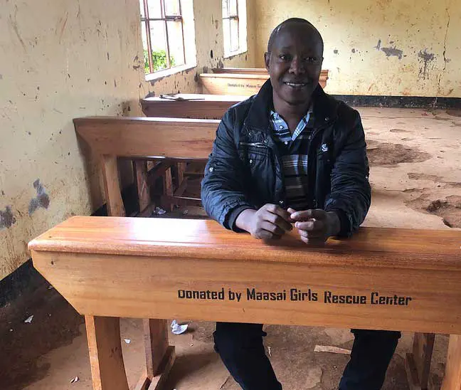 Elisante Sitting at Desk donated by MGRC