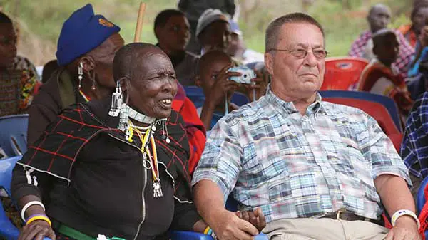Rick, our founder, sharing a moment with the grandmother of MGRC resident, Rachael.