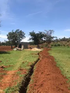 Burying water line from the well to the tank farm over 1 KM away