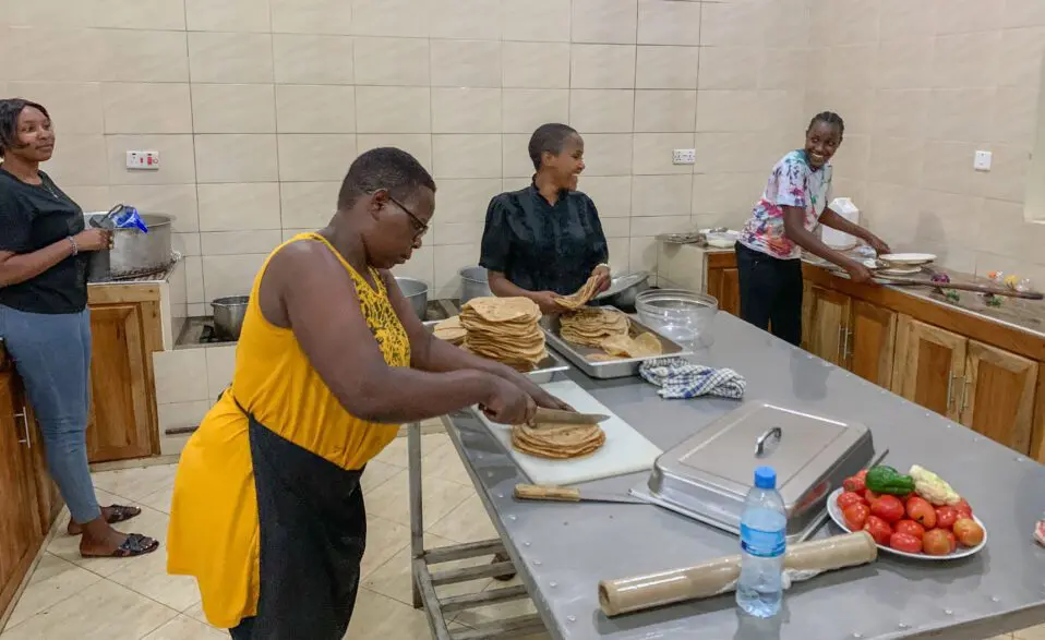 MGRC interns learning how to prepare and cook meals for the future ecolodge.