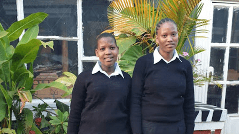 Yeyolai and Nemoipo dressed for vocational college in Karatu