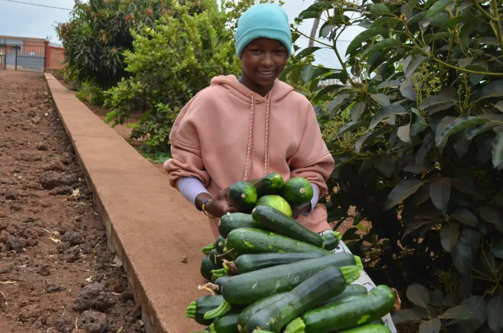 Sinyati with just a few of our zuccini harvest