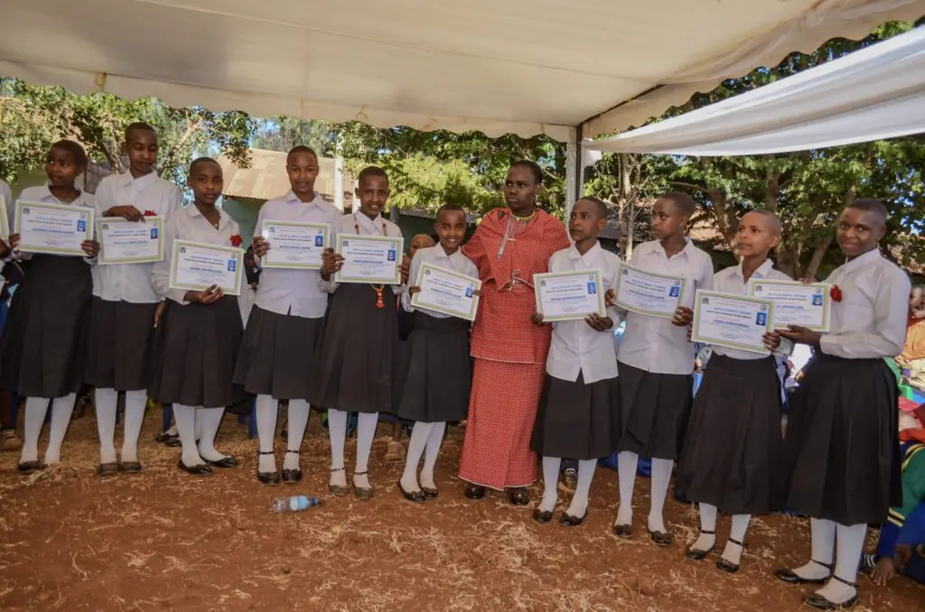 Students receiving certificates at ceremony