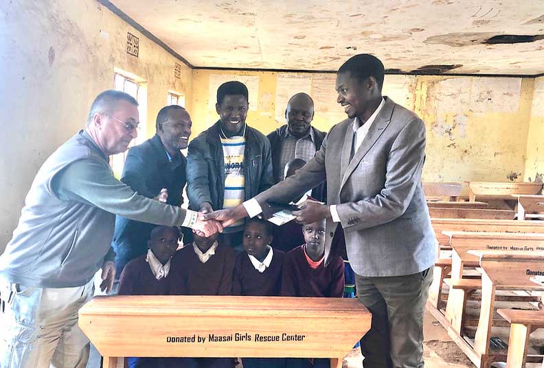 Maasai Girls Rescue Center donates 30 wooden school desk and refurbished classroom
