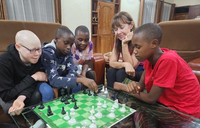 Playing chess with Maasai girls at MGRC