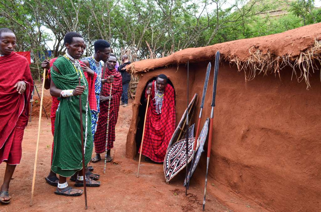 maasai warriors exiting boma