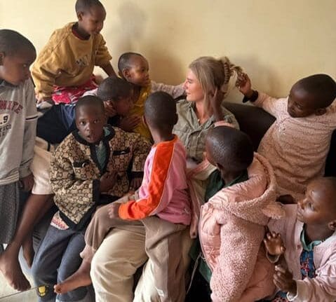 Group of children sitting together showcasing hope in action.